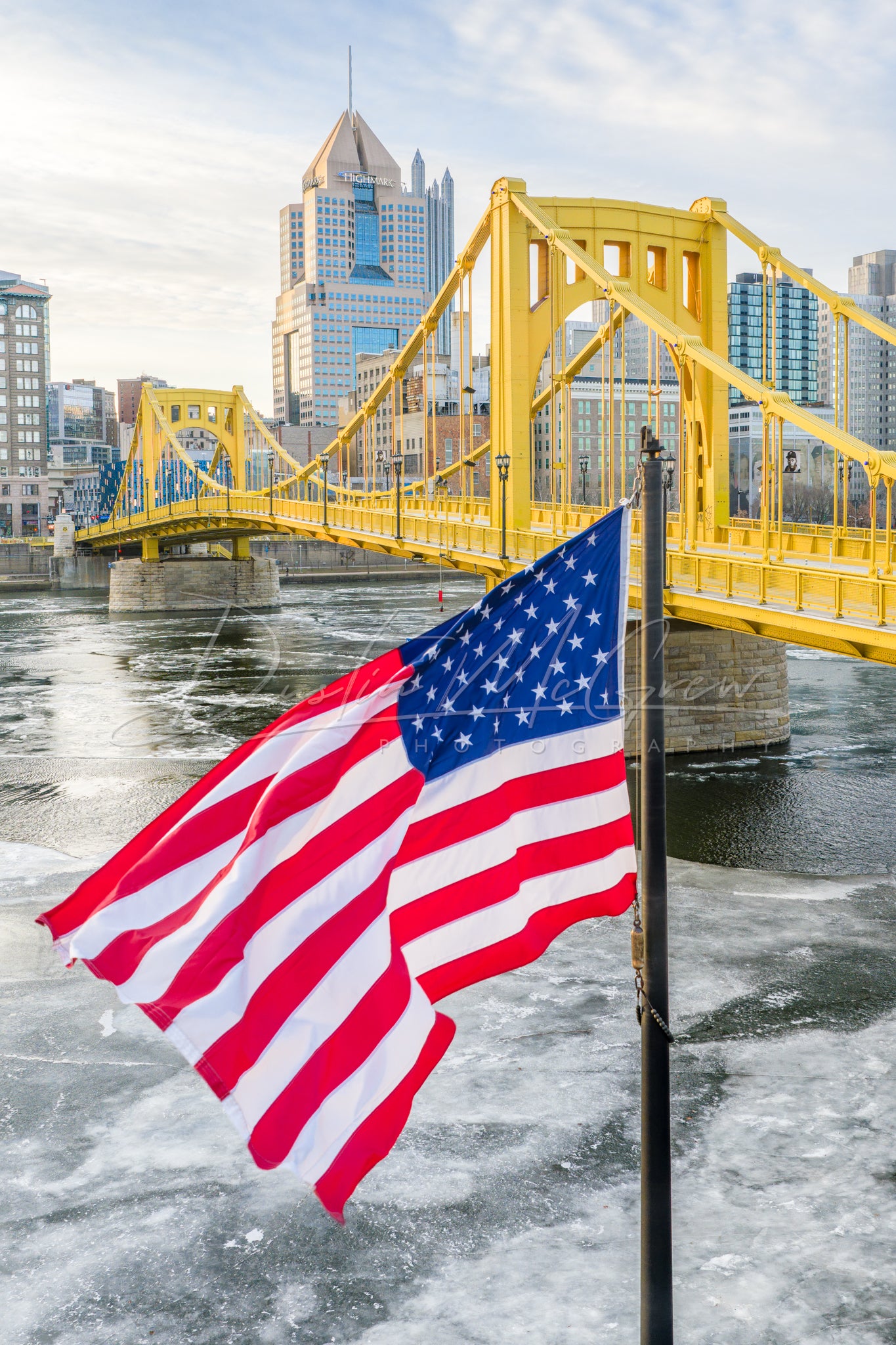 The US Flag and Clemente Bridge on a Frigid Day