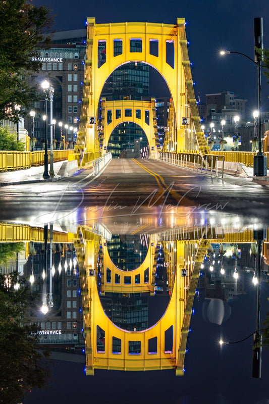 Clemente Bridge Puddle Reflection