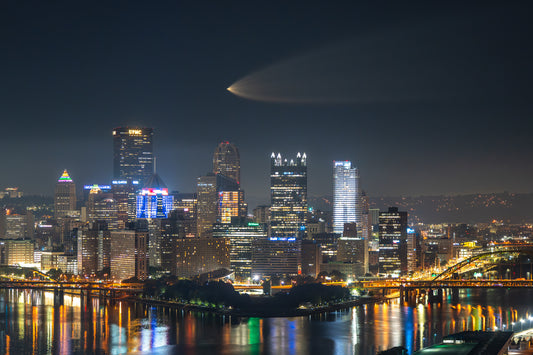 SpaceX Falcon 9 Rocket and the Pittsburgh Skyline