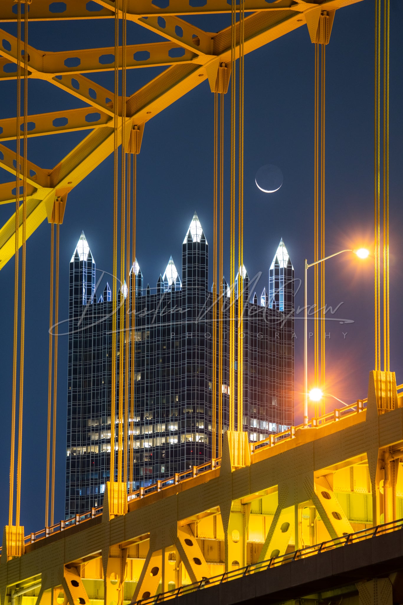 PPG Place and Moon Framed by the Fort Pitt Bridge