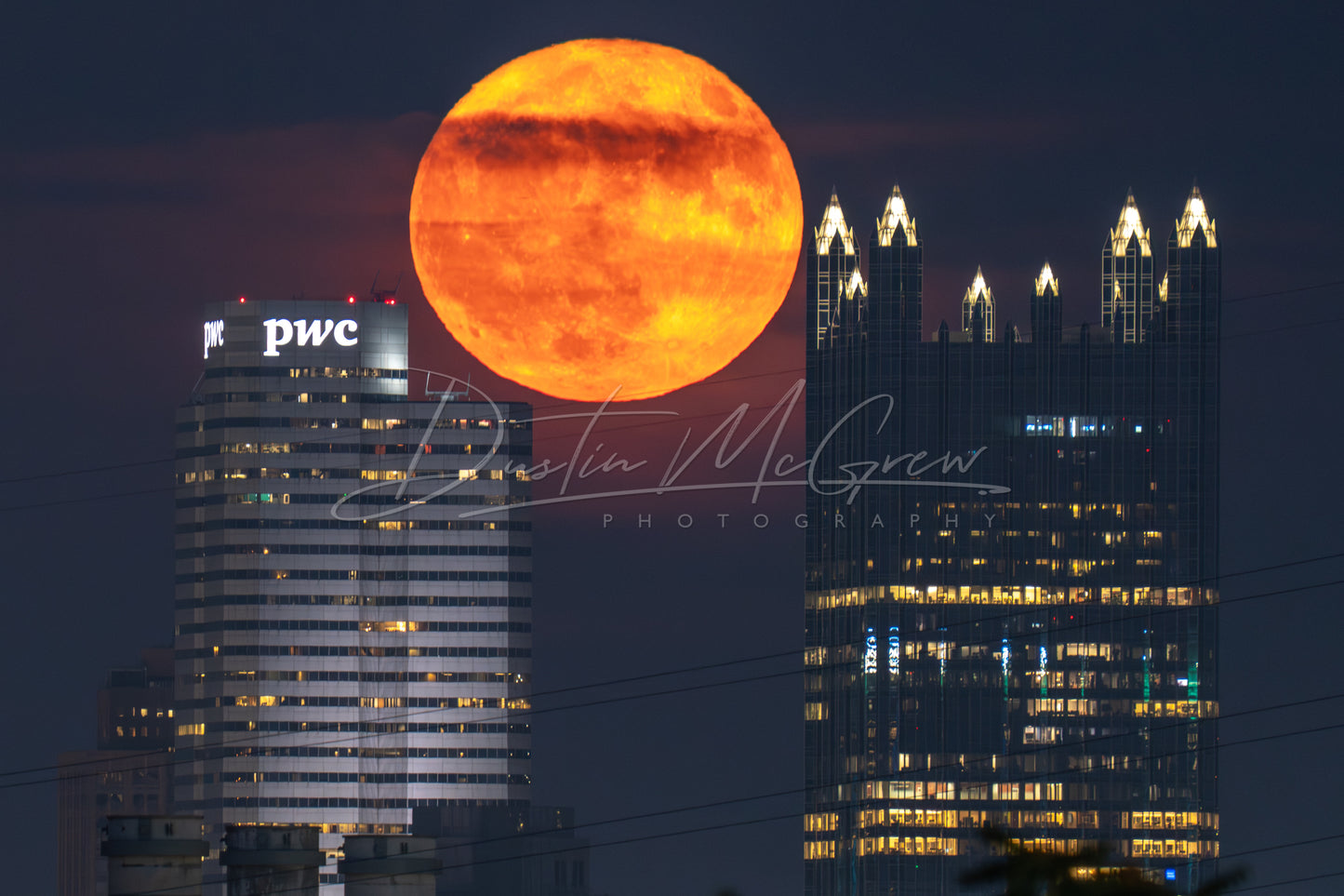 The Full Moon Between PPG Place and One Oxford Centre in Pittsburgh