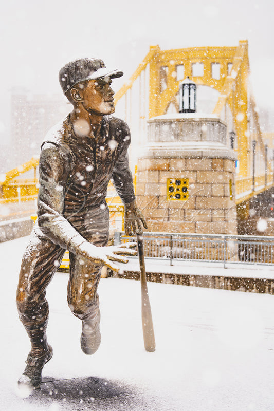 Snowy Roberto Clemente Statue and the Clemente Bridge