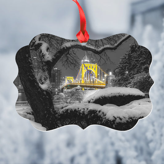 Clemente Bridge Framed by Snow Covered Tree Metal Christmas Ornament