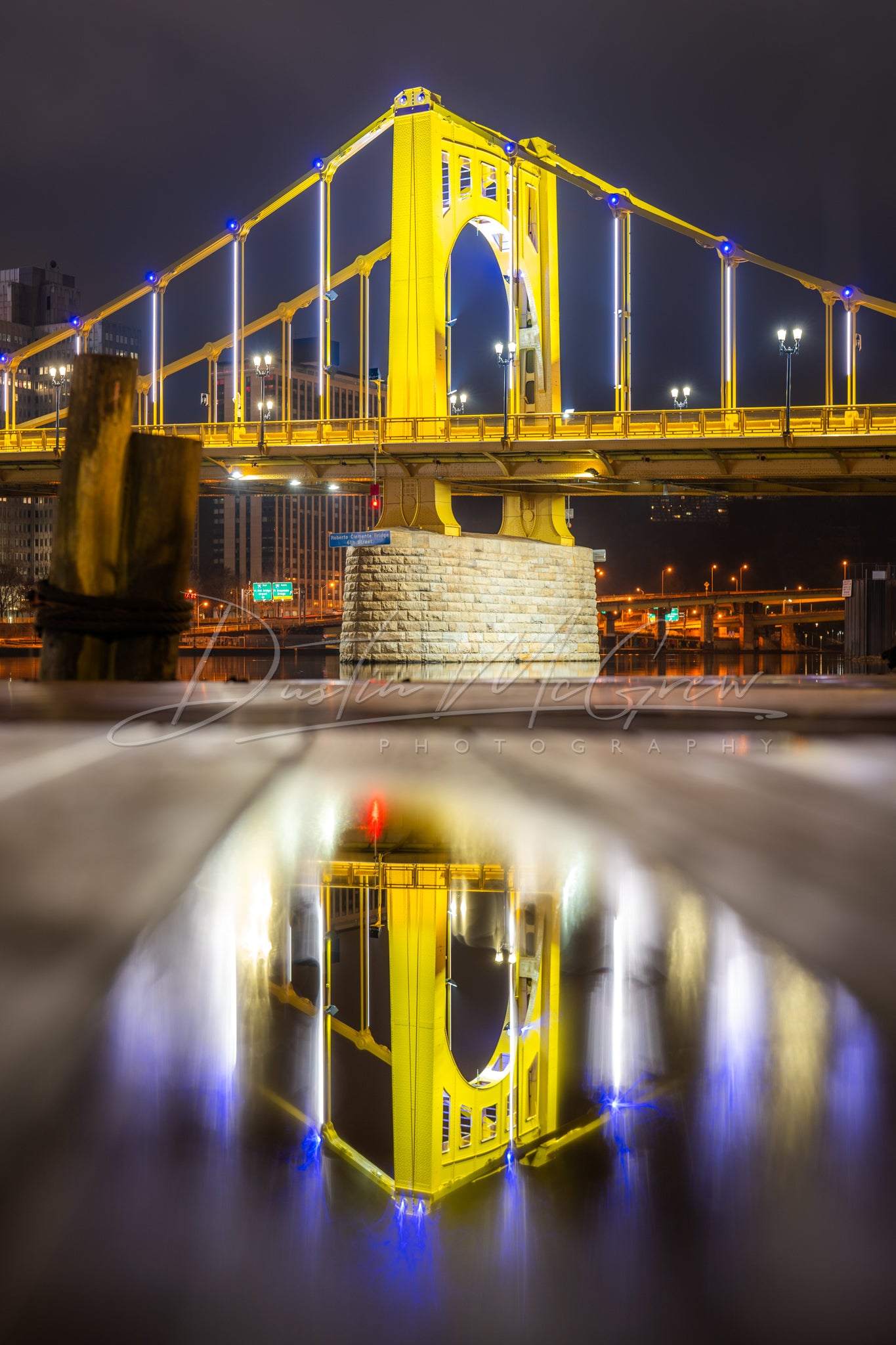 Clemente Bridge Puddle Reflection
