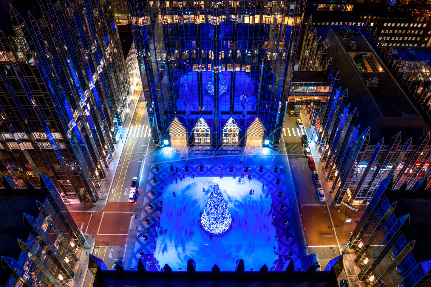 The PPG Place Skating Rink Lit Up in Blue