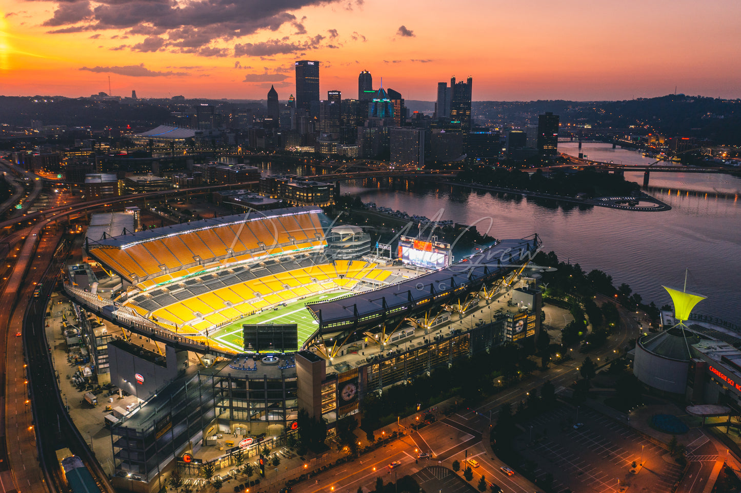 Heinz Field (Acrisure Stadium) and Pittsburgh Skyline at Sunrise