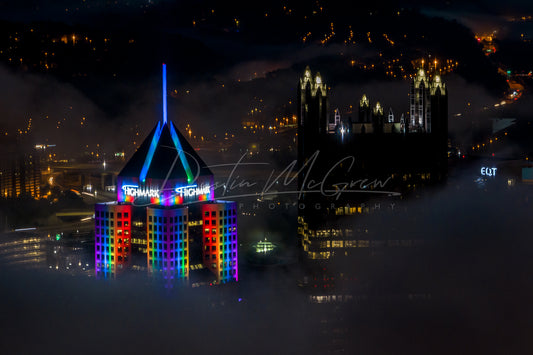 Highmark Building Lit Up in Rainbow Colors in the Fog