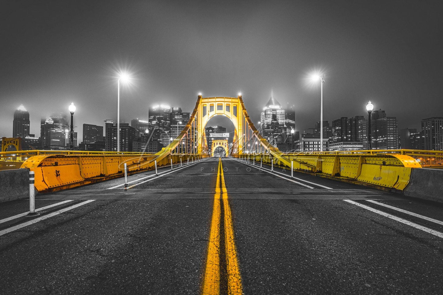 Clemente Bridge With A Foggy Pittsburgh Skyline